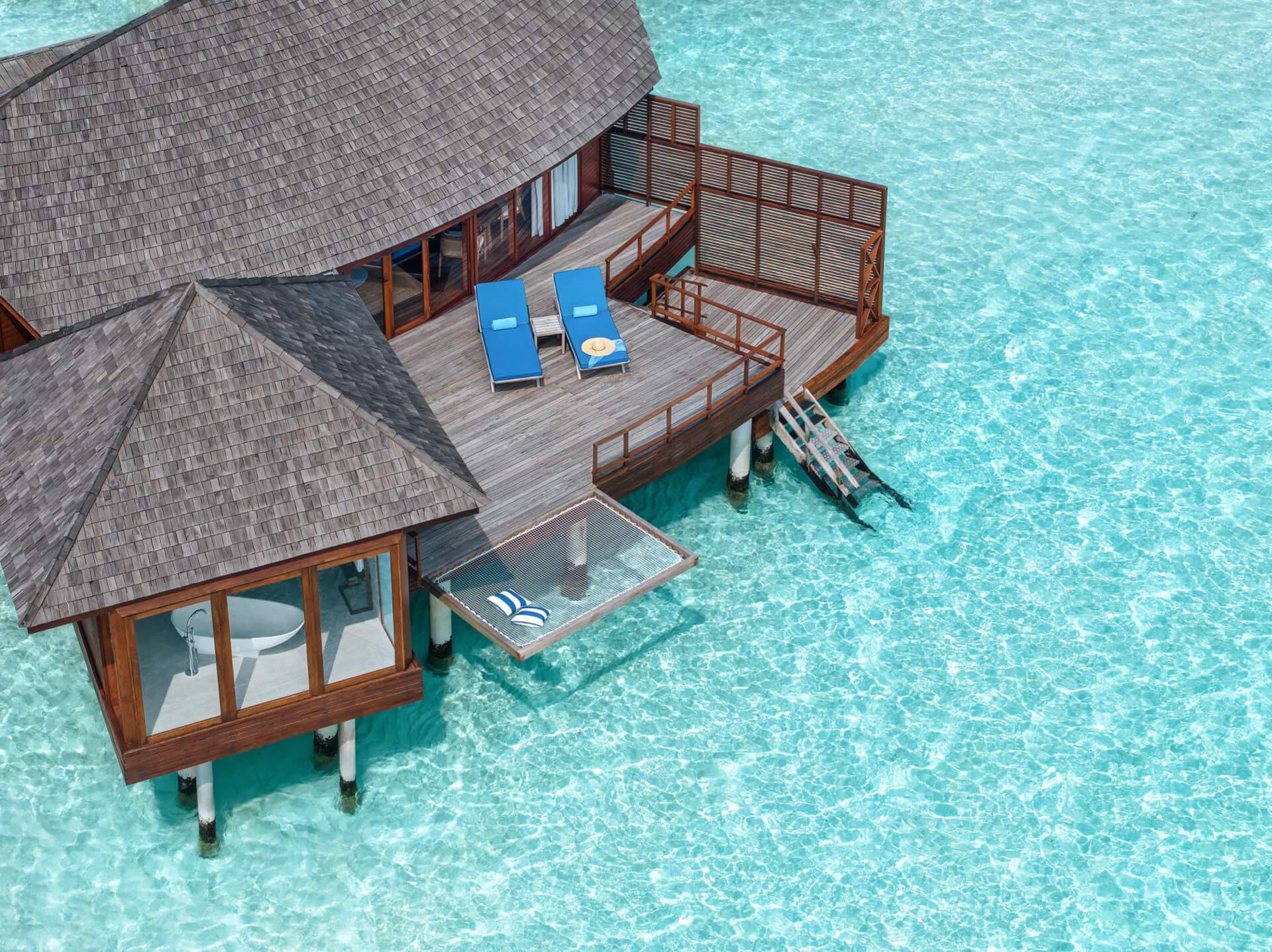 Anantara Dhigu Maldives - Sunrise Over Water Villa Aerial